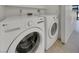 Laundry room with modern washer and dryer units, maximizing convenience at 1575 W Warm Springs Rd # 1111, Henderson, NV 89014