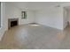 Spacious living area filled with natural light from a large window and cozy fireplace makes an inviting atmosphere at 1575 W Warm Springs Rd # 1111, Henderson, NV 89014