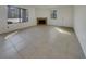 Spacious living room with tile flooring and fireplace for added comfort at 1575 W Warm Springs Rd # 1111, Henderson, NV 89014