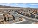 A planned community with sidewalks, landscaping, and mountain views at 1876 Jamie Brook Pl, North Las Vegas, NV 89084
