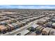 Wide angle aerial of a community with similar homes and landscaping at 1876 Jamie Brook Pl, North Las Vegas, NV 89084