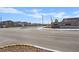 Street view of the Heartland community showcasing the neighborhood's well-maintained roads and attractive landscaping at 1876 Jamie Brook Pl, North Las Vegas, NV 89084
