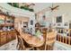 Open-concept dining room offering a large wooden table, stylish decor, and access to the living area at 20 High Sierra Dr, Henderson, NV 89074