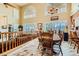 Stylish dining room featuring wood flooring, a large dining table set, and ample natural light at 20 High Sierra Dr, Henderson, NV 89074