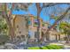 Two-story home with mature trees and a three-car garage at 20 High Sierra Dr, Henderson, NV 89074