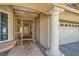 Front porch with security gate, decorative pillar, and tile at 20 High Sierra Dr, Henderson, NV 89074