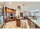 Functional kitchen featuring stainless steel appliances, ample counter space, and wood cabinets at 20 High Sierra Dr, Henderson, NV 89074