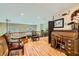 Upstairs landing area featuring a charming roll top desk and sitting area at 20 High Sierra Dr, Henderson, NV 89074