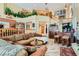 Inviting living room with high ceilings, elegant decor, and an open staircase leading to the upper level at 20 High Sierra Dr, Henderson, NV 89074