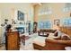 Spacious living room with high ceilings, fireplace, and ample natural light at 20 High Sierra Dr, Henderson, NV 89074