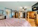 Large main bedroom featuring beautiful wood floors, ample dresser space, and neutral wall color at 20 High Sierra Dr, Henderson, NV 89074