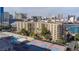 Stunning aerial view overlooking pool, tennis courts and cityscape at 205 E Harmon Ave # 707, Las Vegas, NV 89169