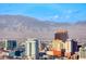 Panoramic city view featuring the iconic Luxor Hotel and surrounding buildings with mountain backdrop at 222 Karen Ave # 3908, Las Vegas, NV 89109