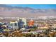 City skyline with a mix of buildings and residential area with mountains at 222 Karen Ave # 3908, Las Vegas, NV 89109