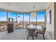 Chic dining area with a modern chandelier and panoramic views of the city skyline at 222 Karen Ave # 3908, Las Vegas, NV 89109