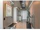 Hallway featuring unique wall decor, statue art, and modern furnishings at 222 Karen Ave # 3908, Las Vegas, NV 89109