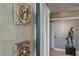 This luxury hallway features unique wall art and a statue, showcasing the condo's sophisticated aesthetic at 222 Karen Ave # 3908, Las Vegas, NV 89109