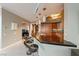 Modern kitchen features a sleek countertop with barstool seating and stainless steel appliances at 222 Karen Ave # 3908, Las Vegas, NV 89109