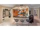 Contemporary kitchen with a breakfast bar and modern fixtures, open to the living spaces at 222 Karen Ave # 3908, Las Vegas, NV 89109