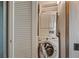 Convenient laundry room with stacked washer and dryer units, maximizing space and functionality at 222 Karen Ave # 3908, Las Vegas, NV 89109