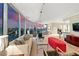 Open living area with plush seating and expansive windows framing the vibrant city skyline at 222 Karen Ave # 3908, Las Vegas, NV 89109