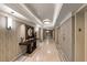 Elegant building lobby featuring stylish decor, including a mirror, textured walls, and recessed lighting at 222 Karen Ave # 3908, Las Vegas, NV 89109