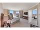 Bright main bedroom with city views and a door leading to a private balcony at 222 Karen Ave # 3908, Las Vegas, NV 89109