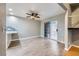Open dining area with modern flooring and sliding glass doors to the patio at 2836 Floral Peak Dr, Henderson, NV 89074
