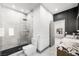 Bathroom featuring a walk-in shower and a granite vanity with dual sinks at 2861 Queens Courtyard Dr, Las Vegas, NV 89109