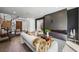 Open-concept living room with a cozy fireplace and elegant decor at 2861 Queens Courtyard Dr, Las Vegas, NV 89109