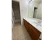 A bright bathroom with double sinks and cabinetry at 3104 Naggio Shores Ave, Las Vegas, NV 89141