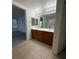Bathroom features double sinks, and tile floors at 3104 Naggio Shores Ave, Las Vegas, NV 89141