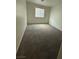 A carpeted bedroom with a window at 3104 Naggio Shores Ave, Las Vegas, NV 89141