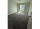 A bedroom with carpeting and one window at 3104 Naggio Shores Ave, Las Vegas, NV 89141