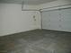 Spacious two-car garage with a clean and organized layout at 3104 Naggio Shores Ave, Las Vegas, NV 89141