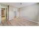Bedroom featuring wood flooring, and access to closet and another room at 3151 Soaring Gulls Dr # 1049, Las Vegas, NV 89128