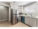 Modern kitchen featuring stainless steel appliances, bright counter tops, and ample cabinet space at 3151 Soaring Gulls Dr # 1049, Las Vegas, NV 89128