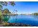 Scenic water view featuring clear turquoise water and lush landscaping, creating a serene and inviting atmosphere at 3151 Soaring Gulls Dr # 1049, Las Vegas, NV 89128