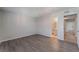Bedroom with modern floors; hallway and bathroom visible from doorway at 3151 Soaring Gulls Dr # 2113, Las Vegas, NV 89128