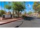 Entrance to Desert Shores Villas Condominiums with signage and well-kept landscaping at 3151 Soaring Gulls Dr # 2113, Las Vegas, NV 89128