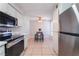 Kitchen overlooking breakfast nook featuring stainless steel appliances and ample counter space at 3151 Soaring Gulls Dr # 2113, Las Vegas, NV 89128