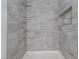 Close up of the tiled shower with a built in nook with new fixtures at 3151 Soaring Gulls Dr # 2113, Las Vegas, NV 89128