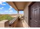 Private balcony with seating area offers serene views, accessible from the unit's exterior door at 405 Paradise Pkwy # 170, Mesquite, NV 89027