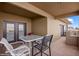 Relaxing balcony area with outdoor seating, barbecue, and ample space for entertaining at 405 Paradise Pkwy # 170, Mesquite, NV 89027