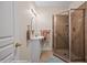 Bathroom featuring glass enclosed shower, vanity sink, framed mirror and modern lighting at 405 Paradise Pkwy # 170, Mesquite, NV 89027