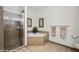 Bathroom showcasing a tiled shower, garden tub, and neutral tones at 405 Paradise Pkwy # 170, Mesquite, NV 89027