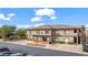 Exterior of a two-story building with desert landscaping, parking, and a well-maintained facade at 405 Paradise Pkwy # 170, Mesquite, NV 89027