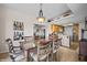 Elegant dining area with a stylish light fixture, connecting to kitchen and bedroom at 405 Paradise Pkwy # 170, Mesquite, NV 89027