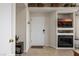 Inviting entryway featuring built-ins, a fireplace, and a stylish console table at 405 Paradise Pkwy # 170, Mesquite, NV 89027