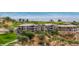 Beautiful exterior featuring landscaping, buildings, and golf course at 405 Paradise Pkwy # 170, Mesquite, NV 89027